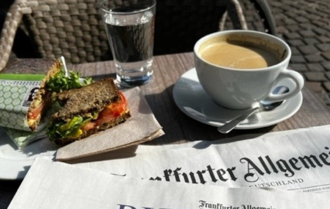 Morning breakfast in Frankfurt with sandwich and coffee